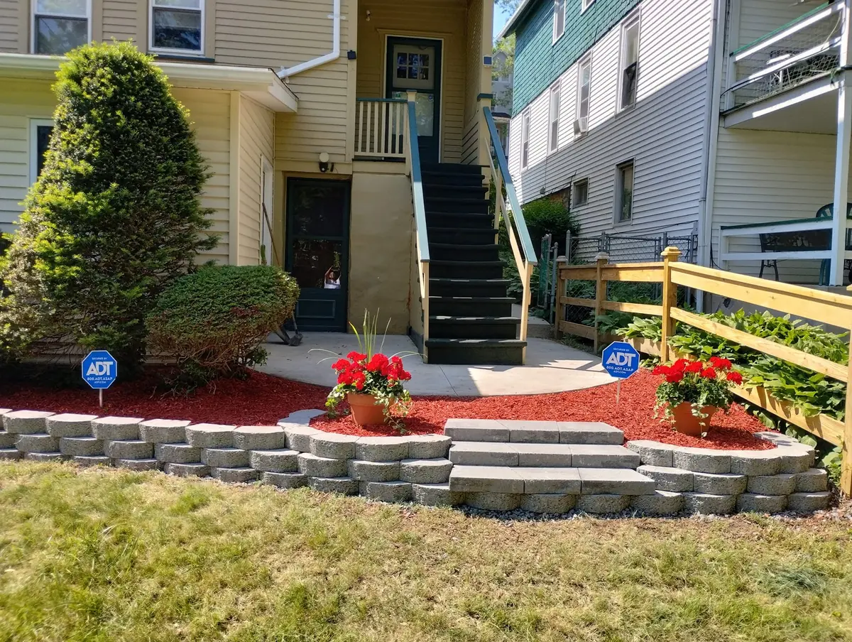 Custom paver steps and retaining wall installed by Maldonado Lawns LLC