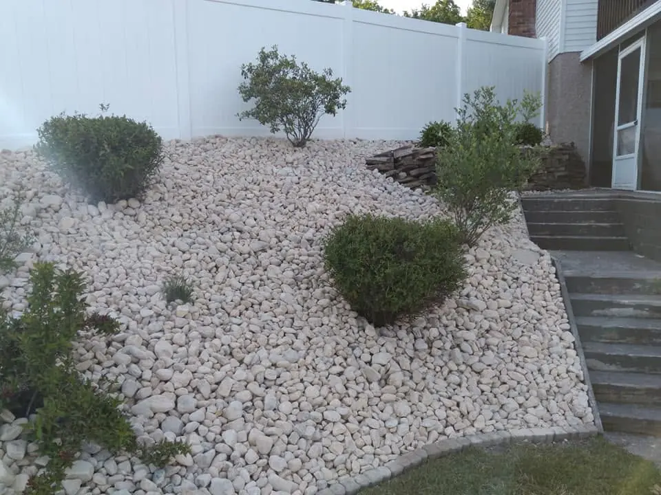 River rock drainage bed installation